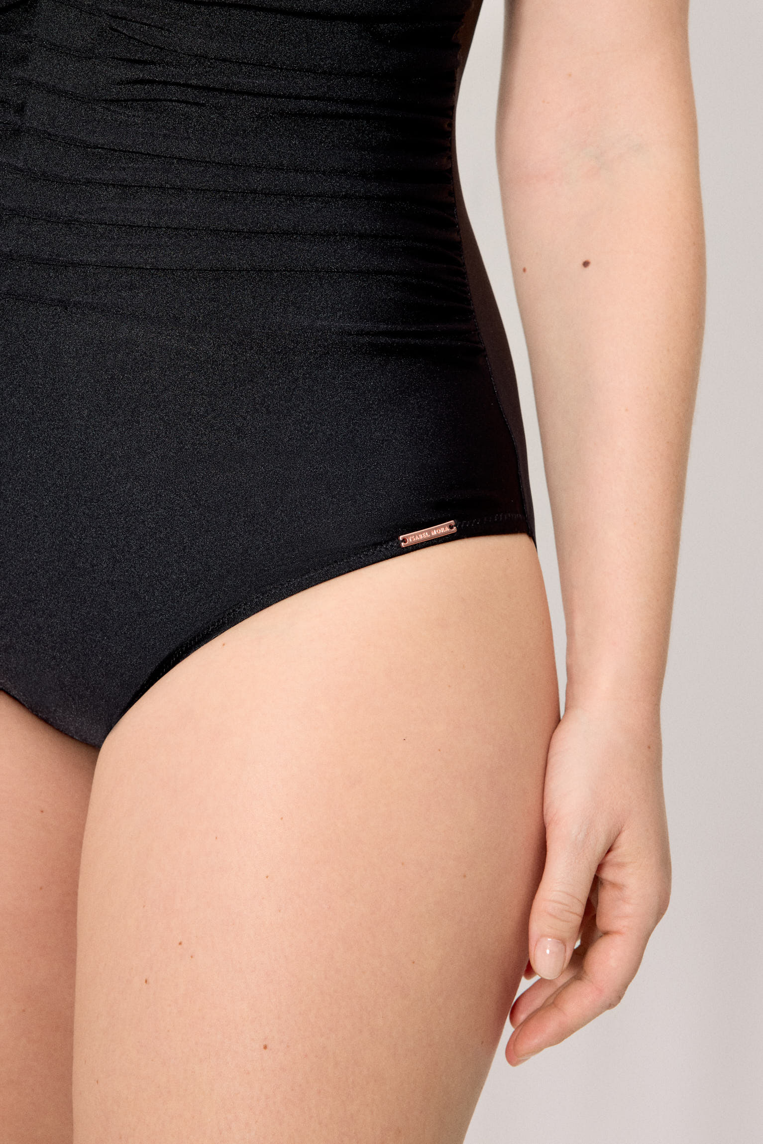 Black glitter swimsuit that reduces bust and abdomen