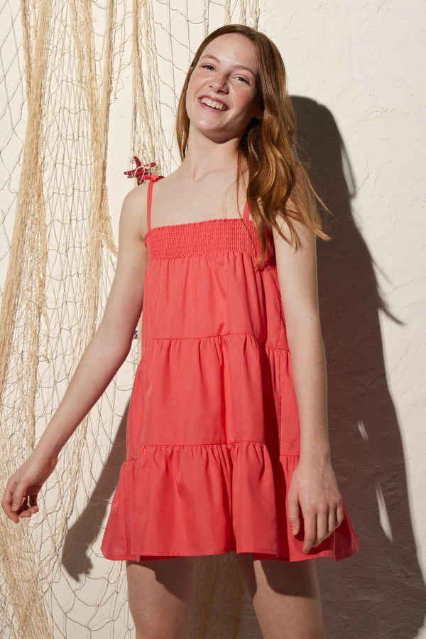 Short teen beach dress with knotted straps and ruffles