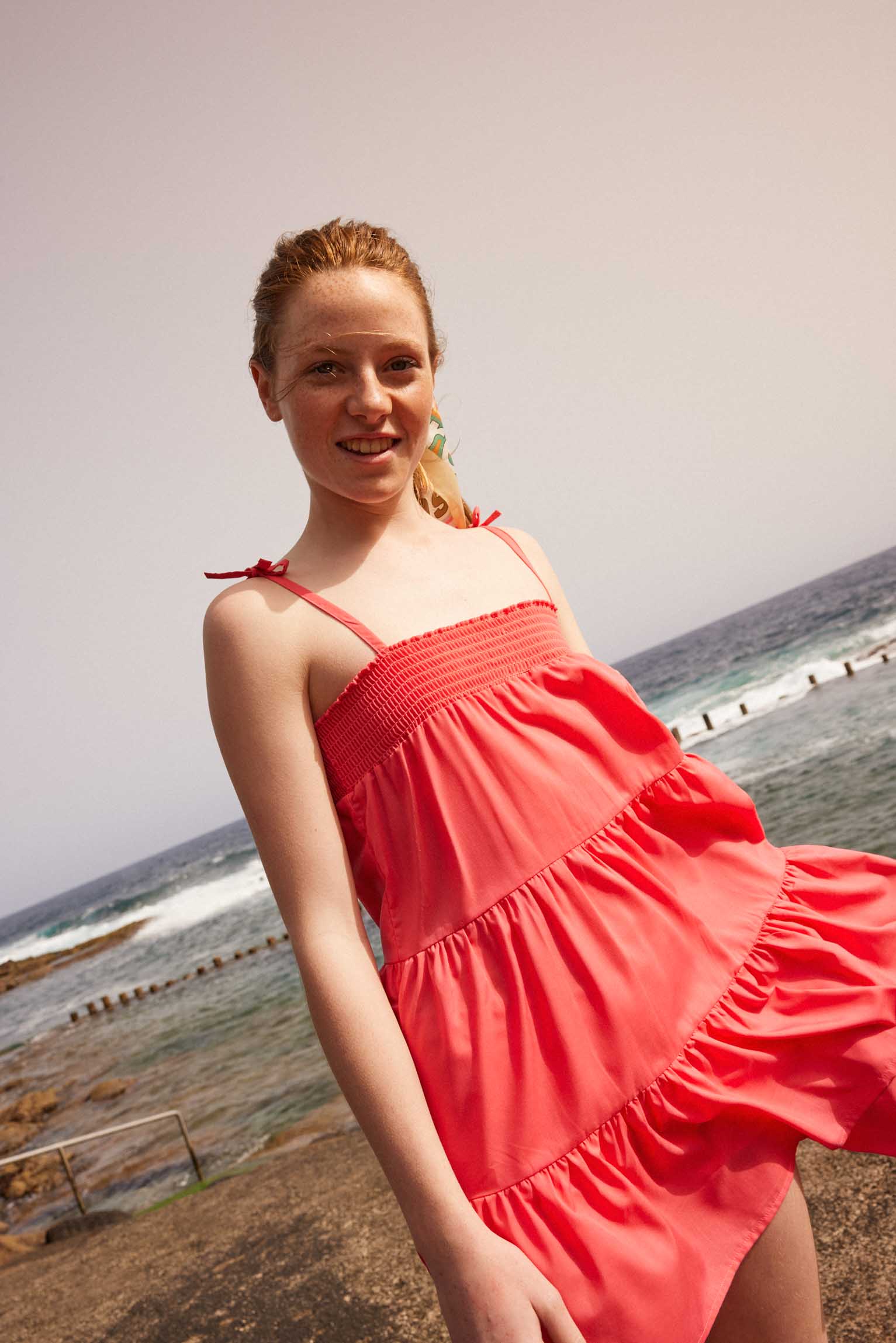 Short teen beach dress with knotted straps and ruffles