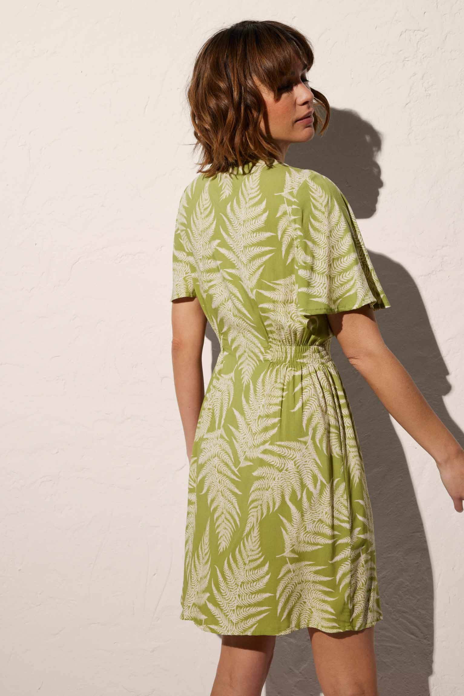 Short tropical print beach dress with buttons