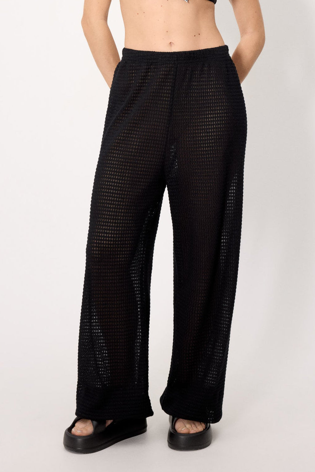 Long black openwork trousers