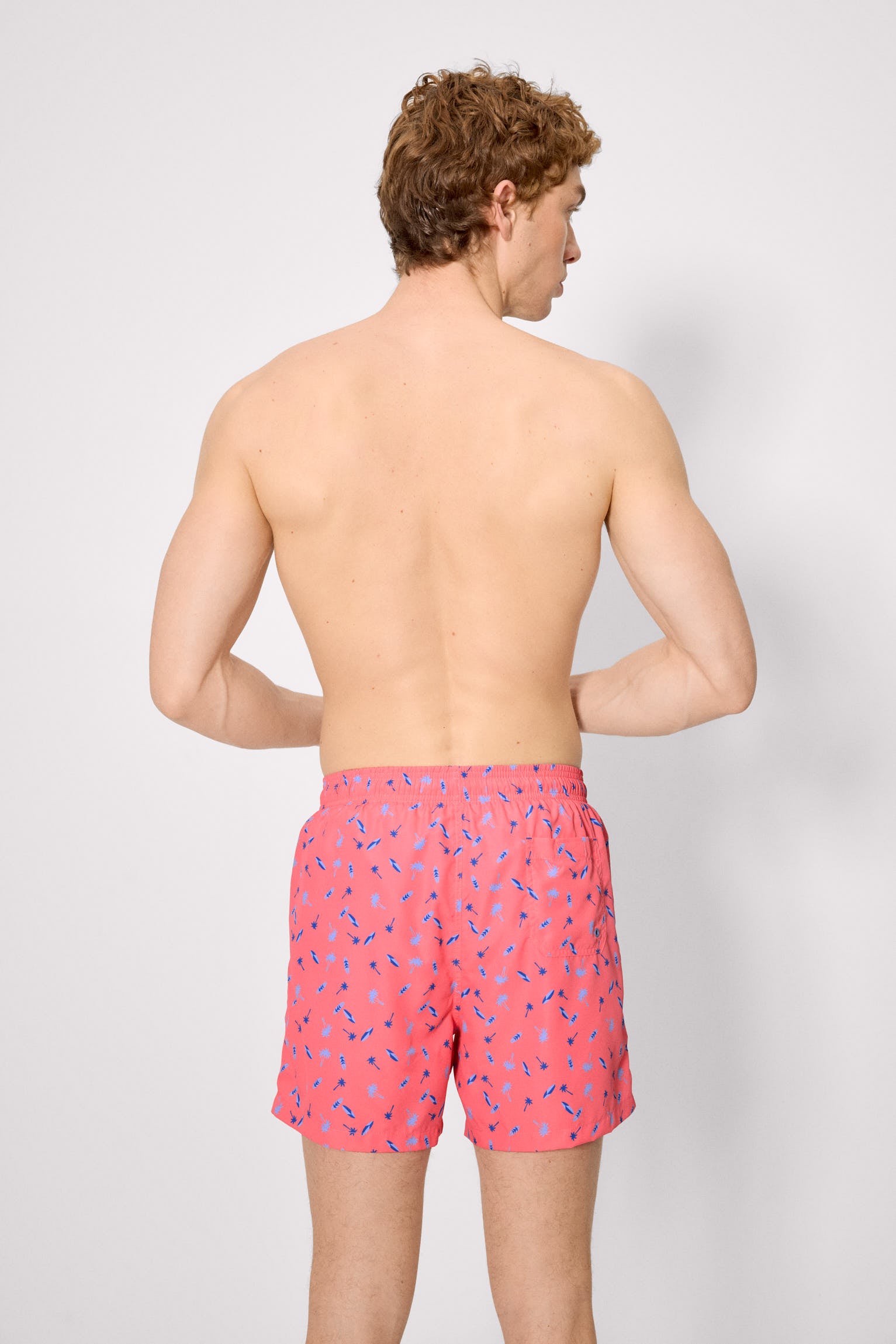 Half swimsuit with palm tree and surfboard print