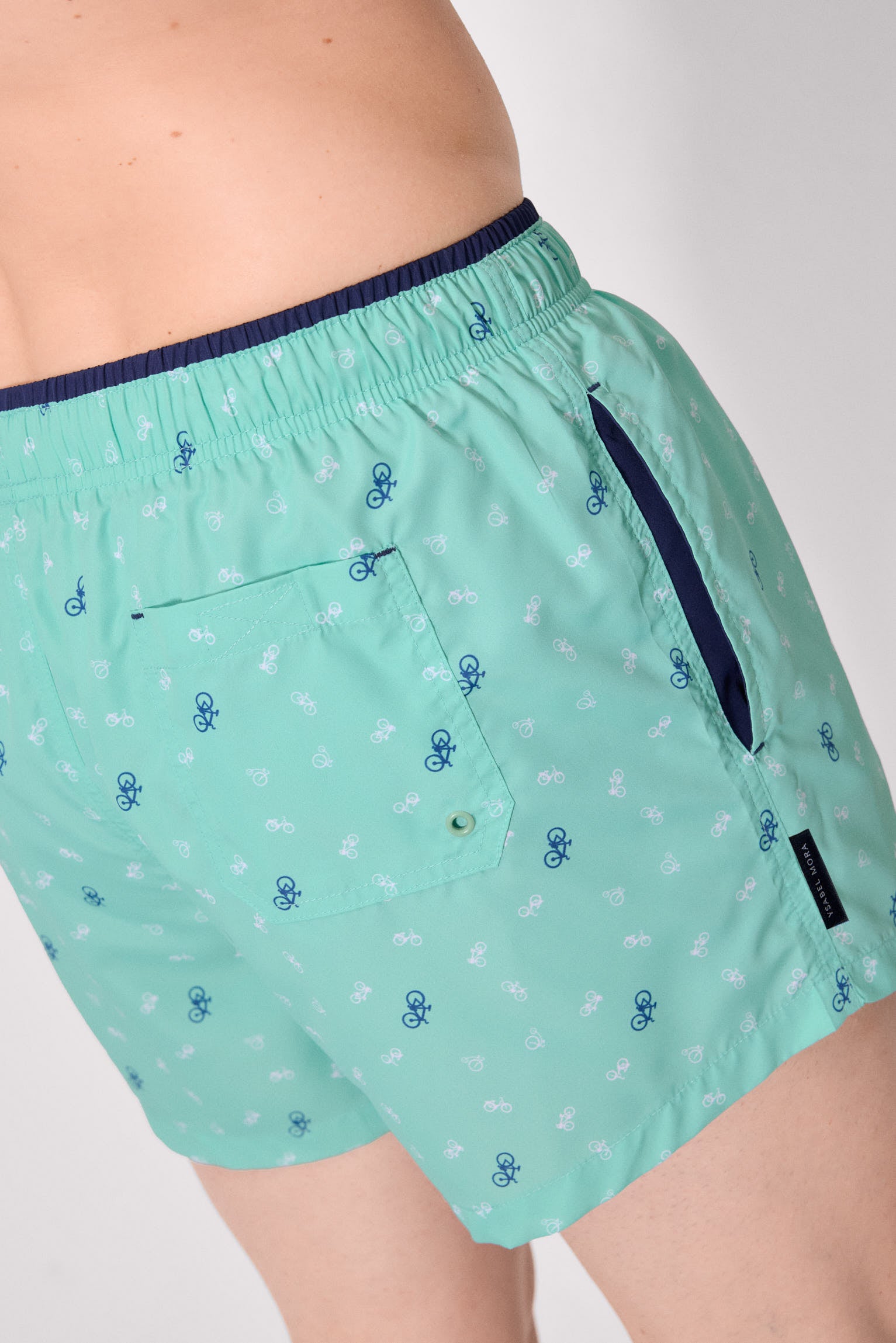 Green bicycle print swim trunks