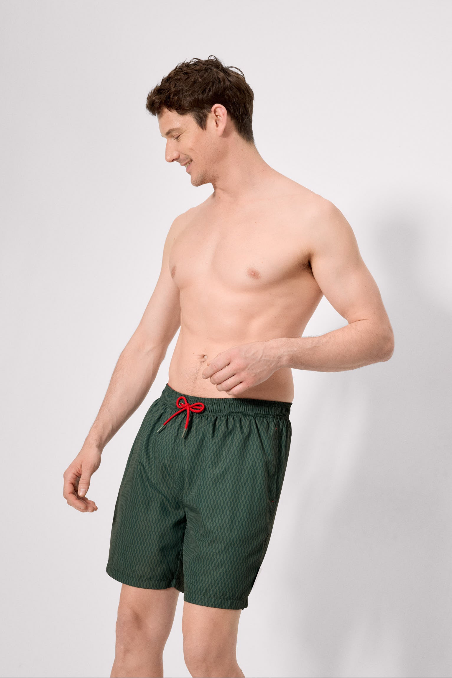 Long swimsuit with green ethnic print