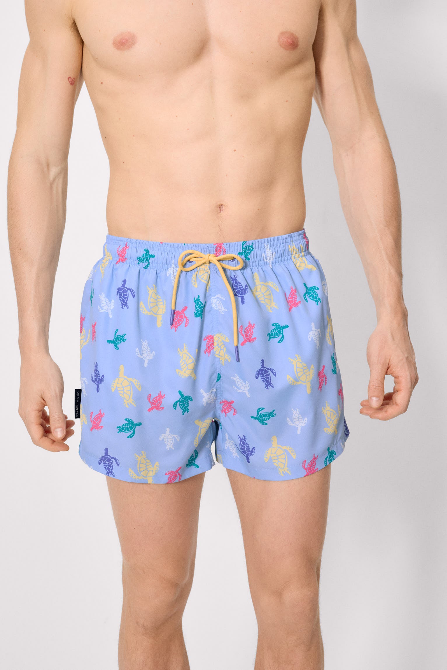 Short swimsuit with multicolored turtle print