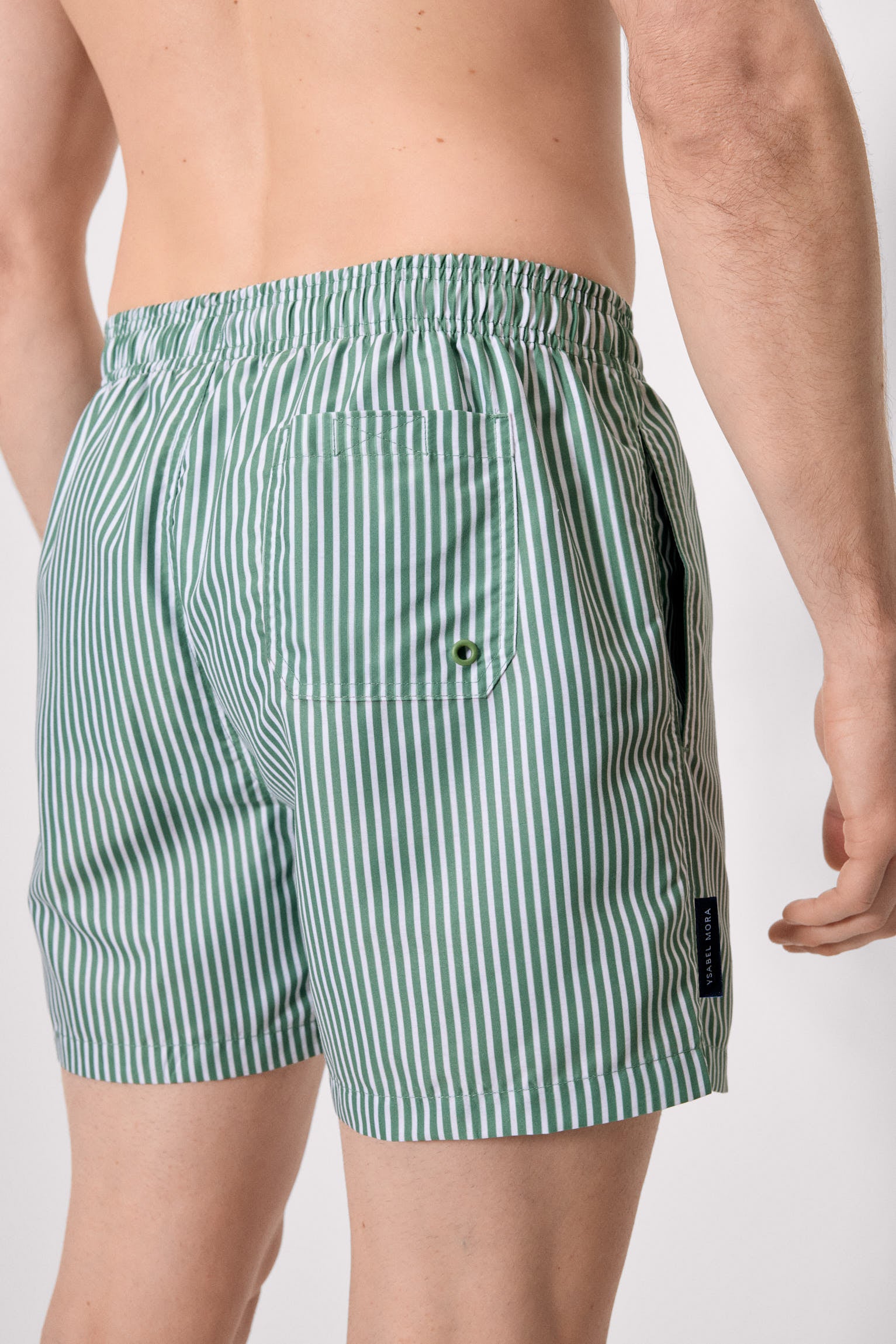 Medium-length swimsuit with green striped print