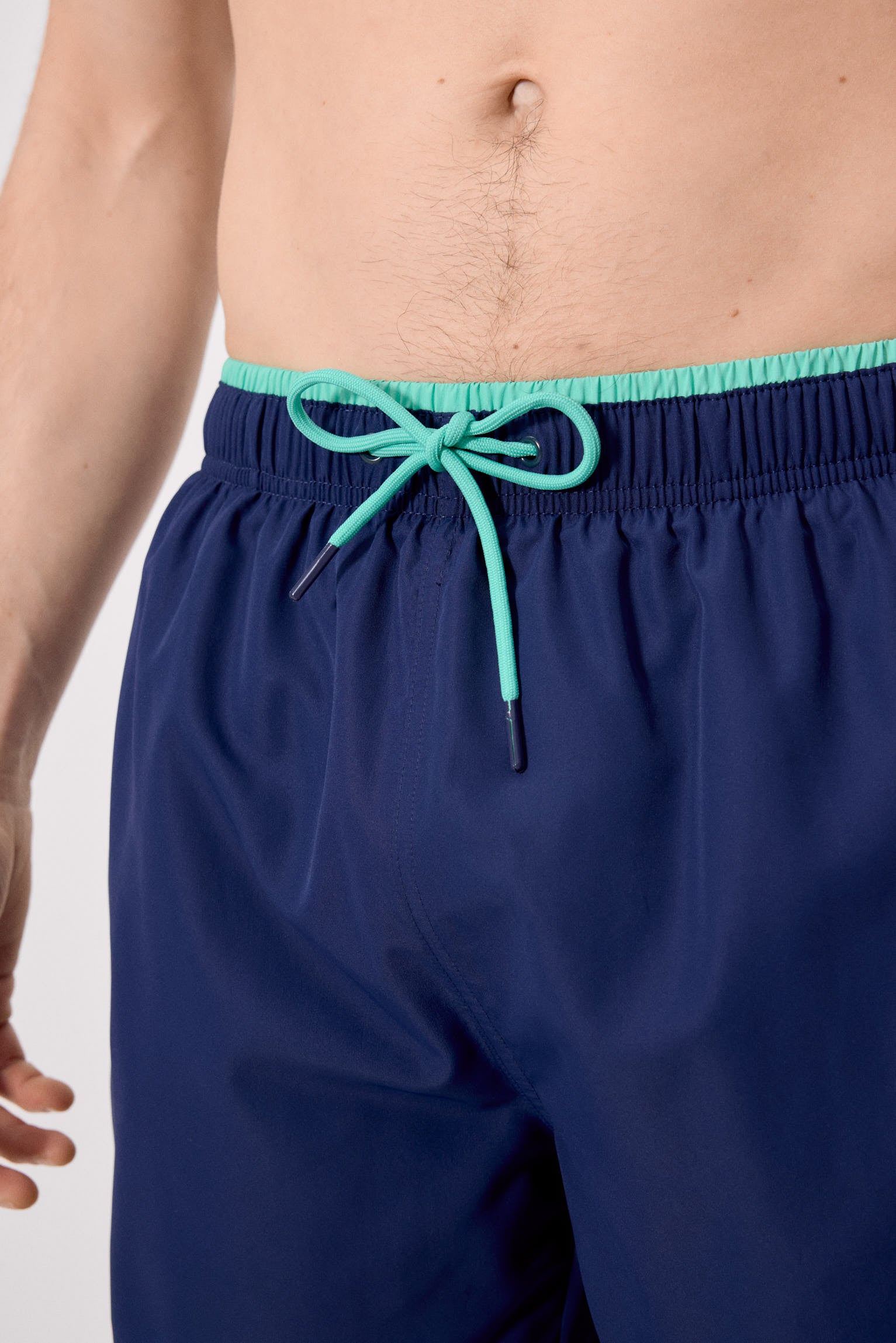 basic navy swimsuit with waist detail.