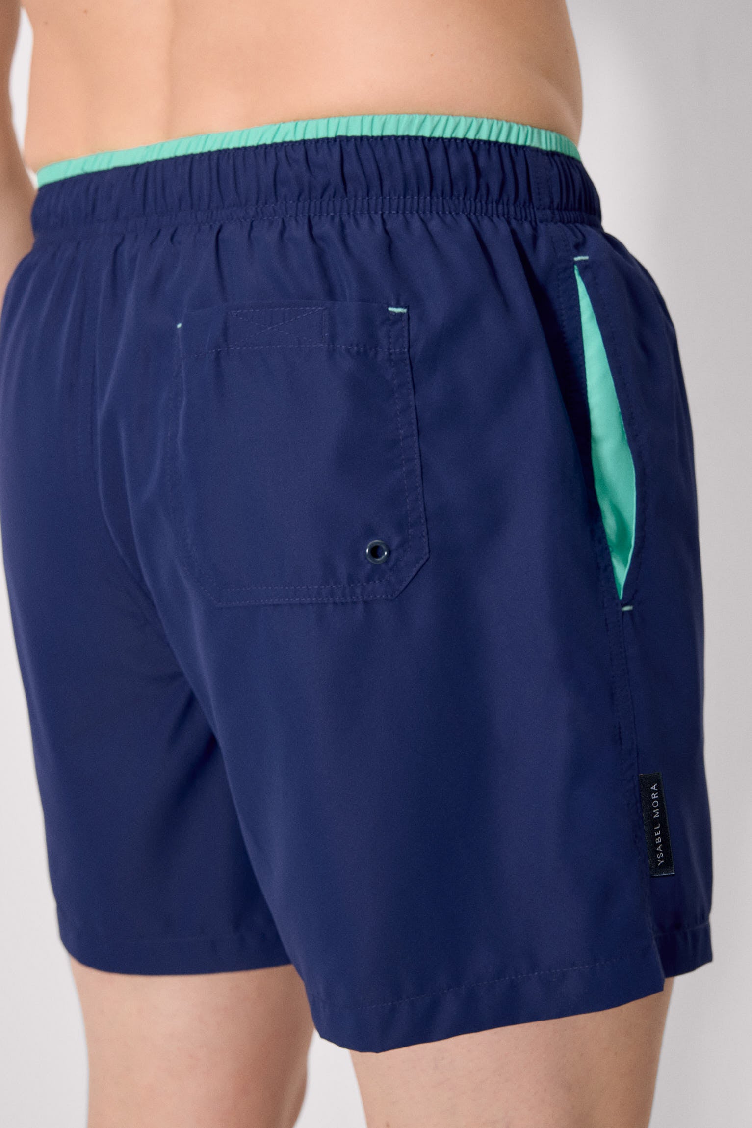 basic navy swimsuit with waist detail.