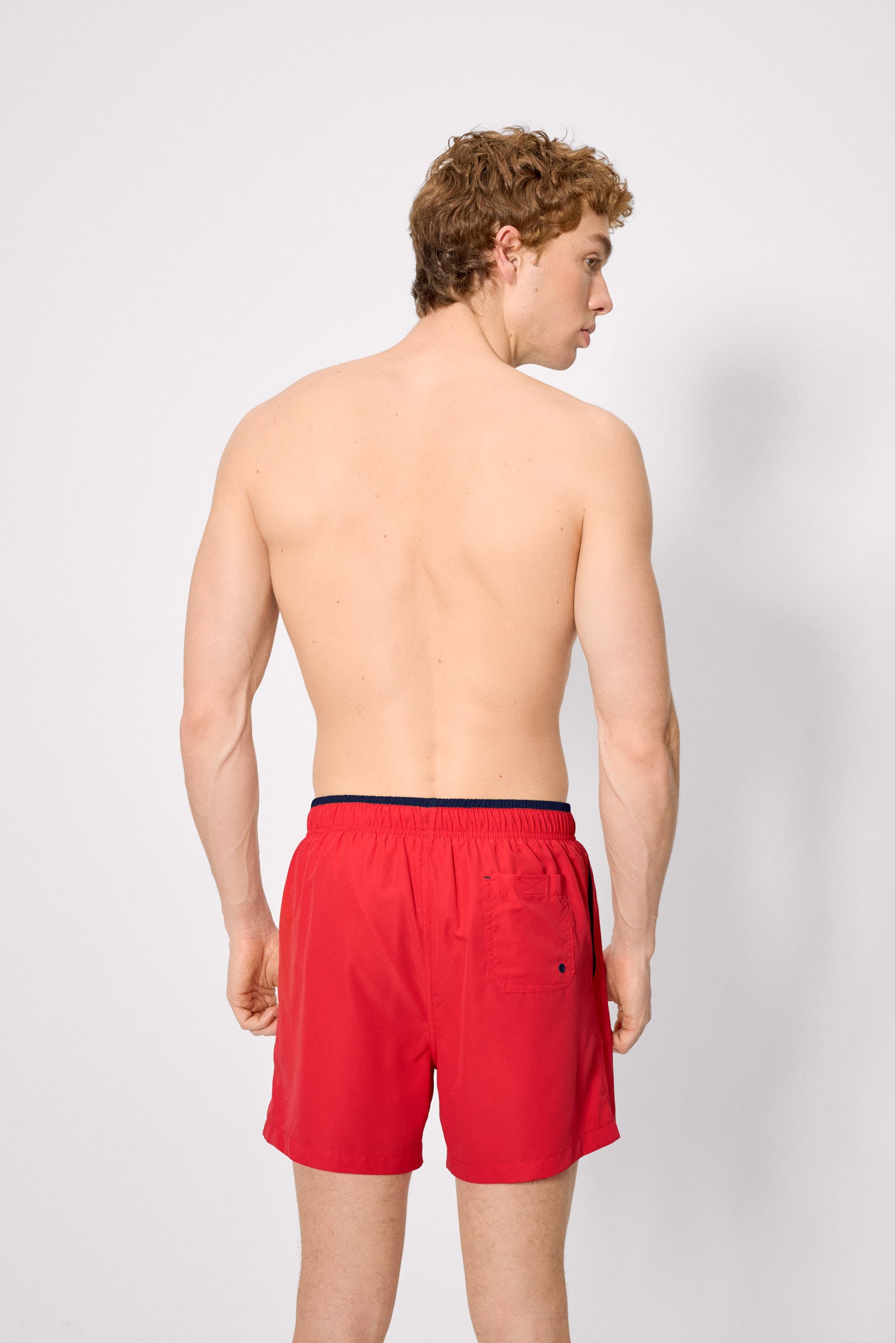 Half swimsuit with red waist detail