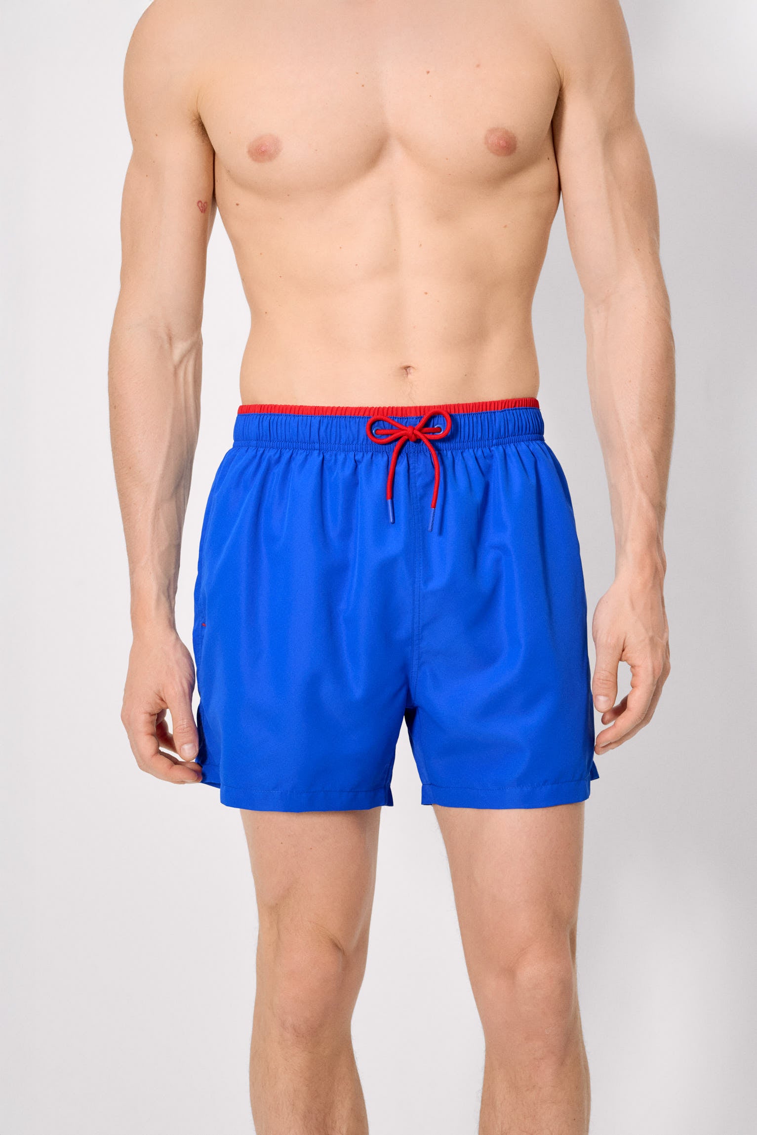 Half swimsuit with blue waist detail