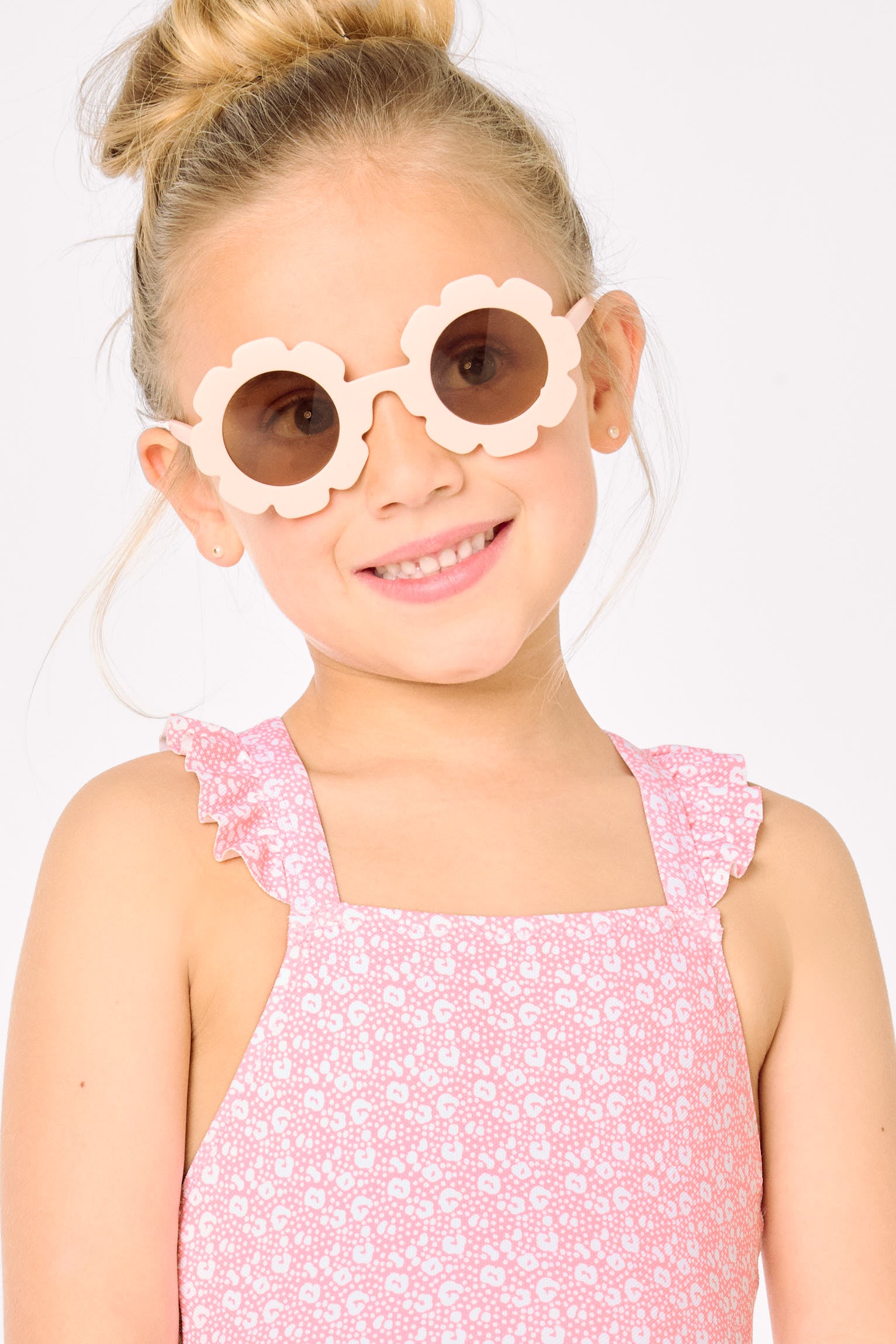 Girls' swimsuit with ruffle details and crossed straps, pink leopard print