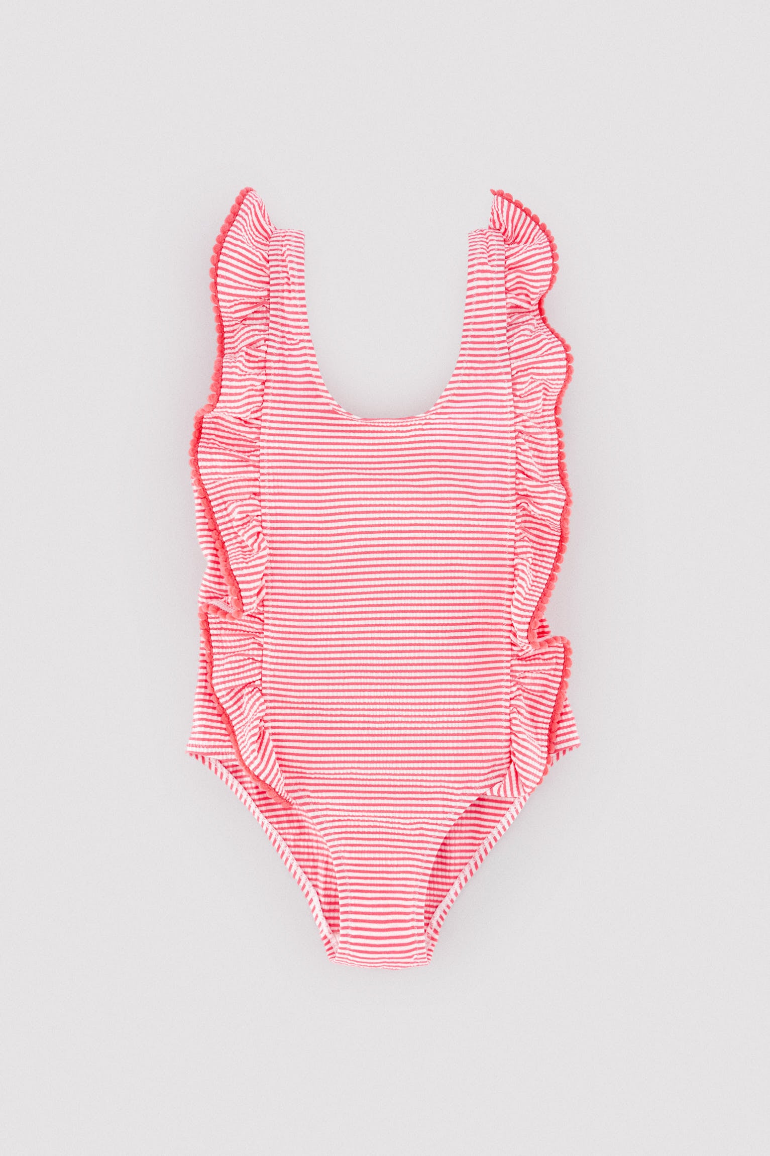Girls' swimsuit with ruffled striped print