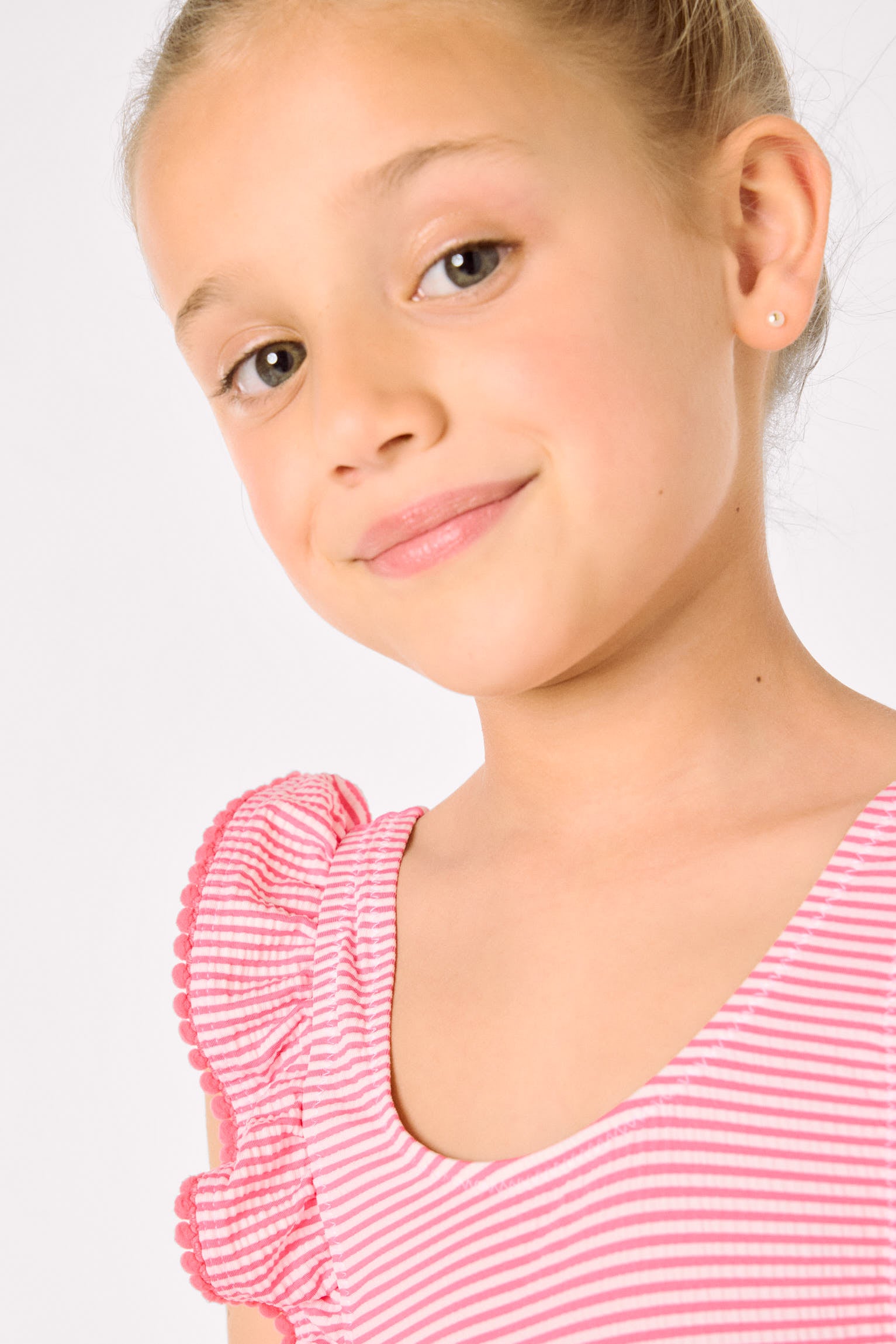 Girls' swimsuit with ruffled striped print