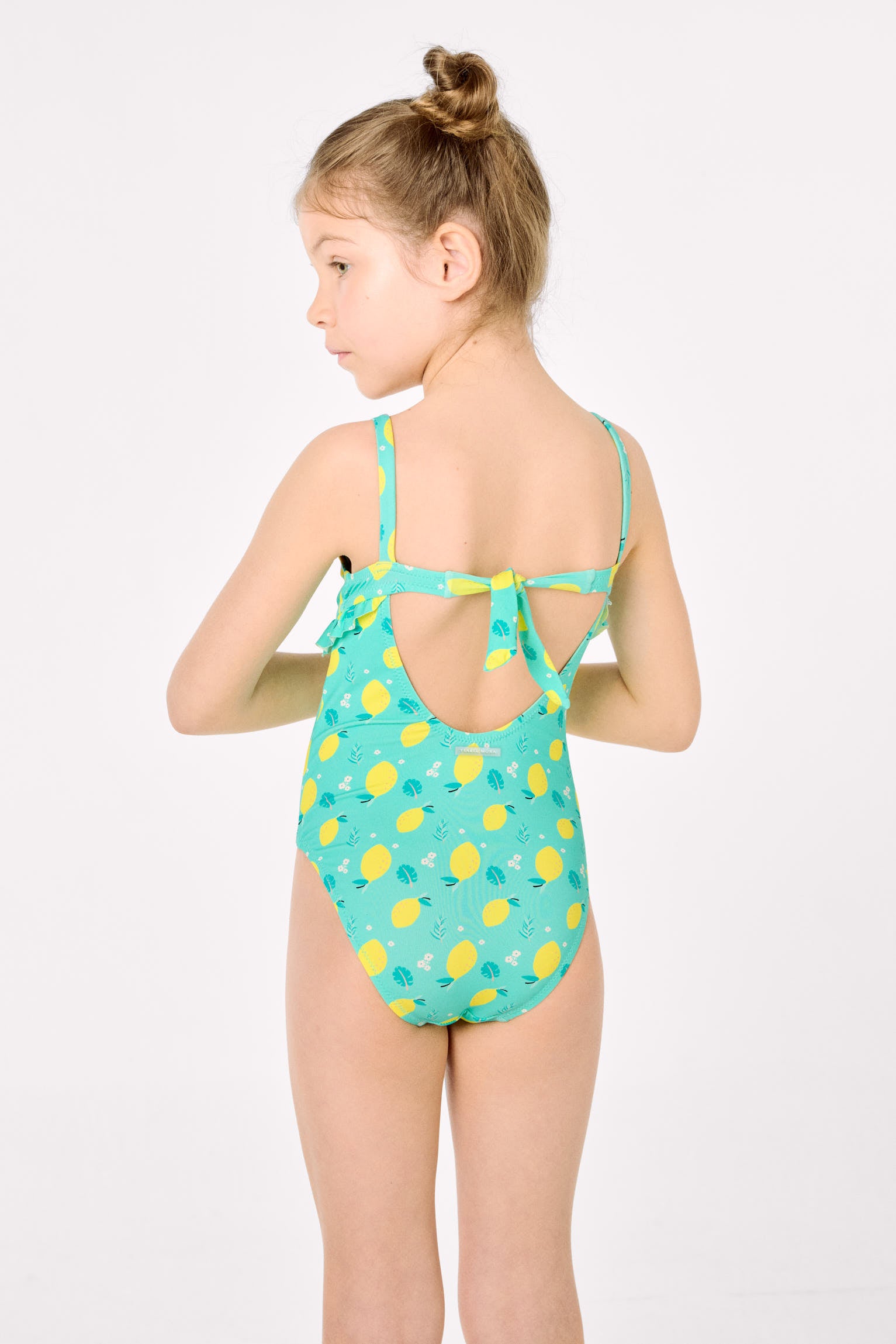 Girl's swimsuit with lemon print ruffle detail