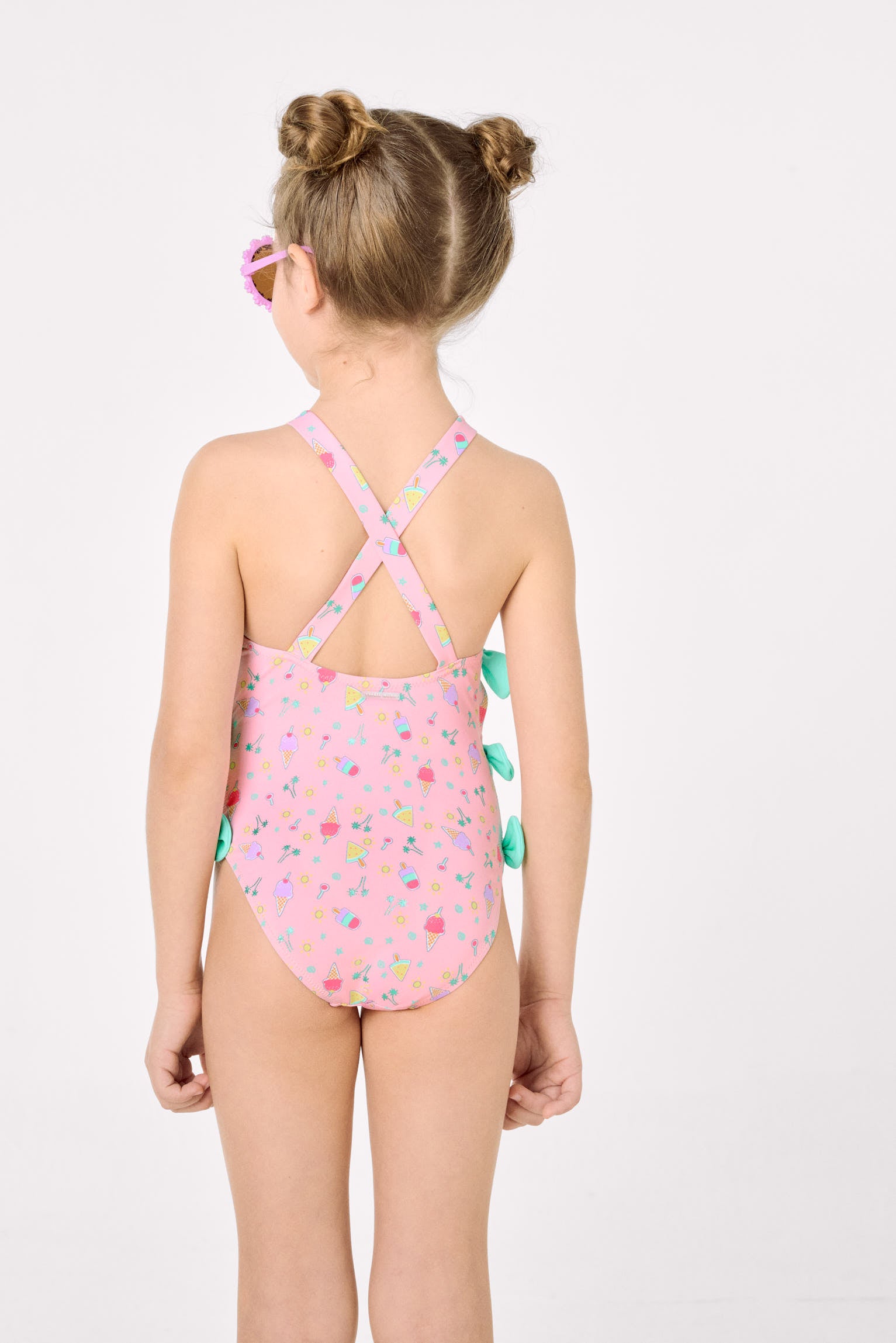 Girls' swimsuit with cut-out detail and bows, summer print