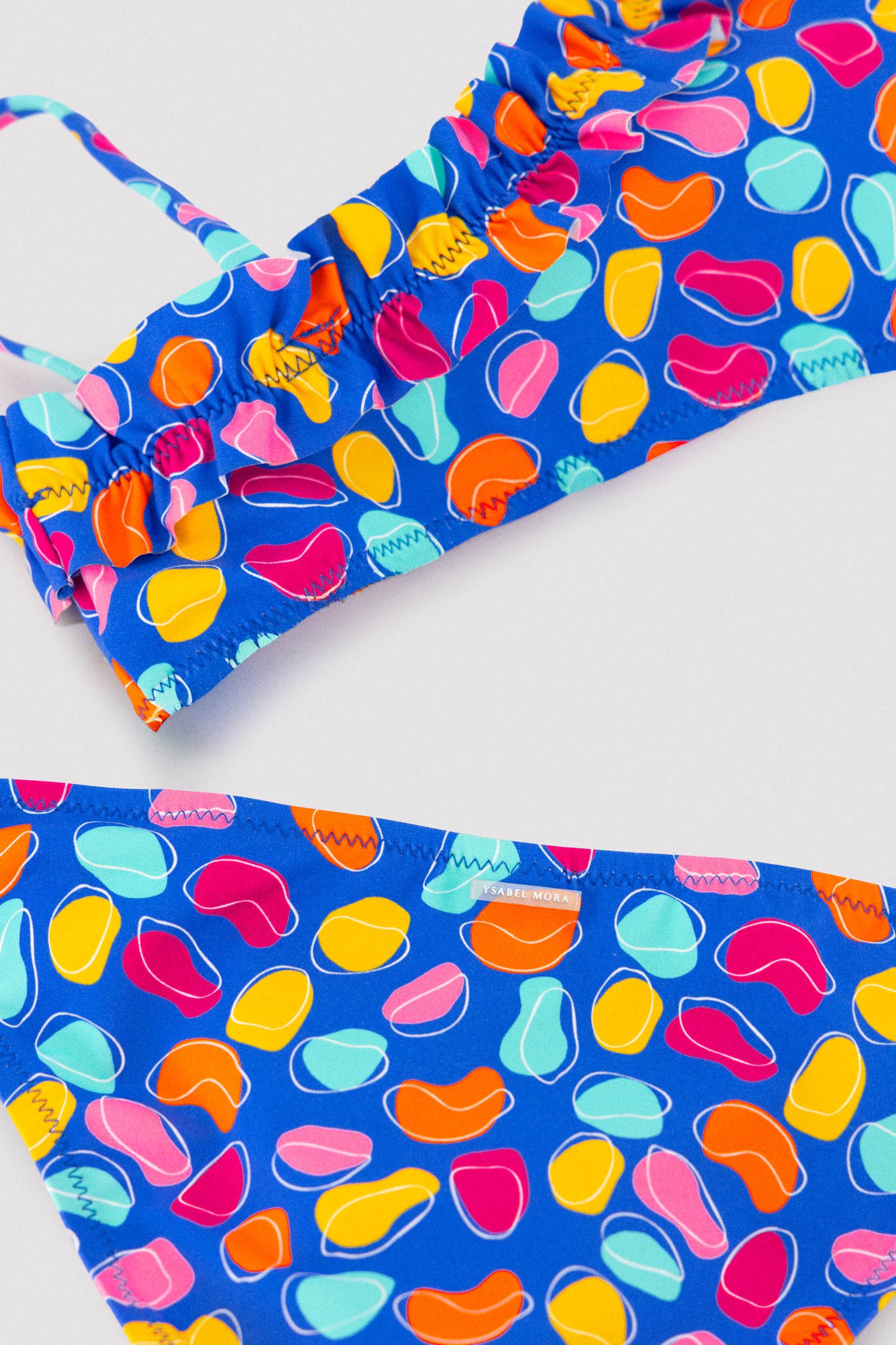 Girls' bikini with ruched detail and multicolored organic shapes print