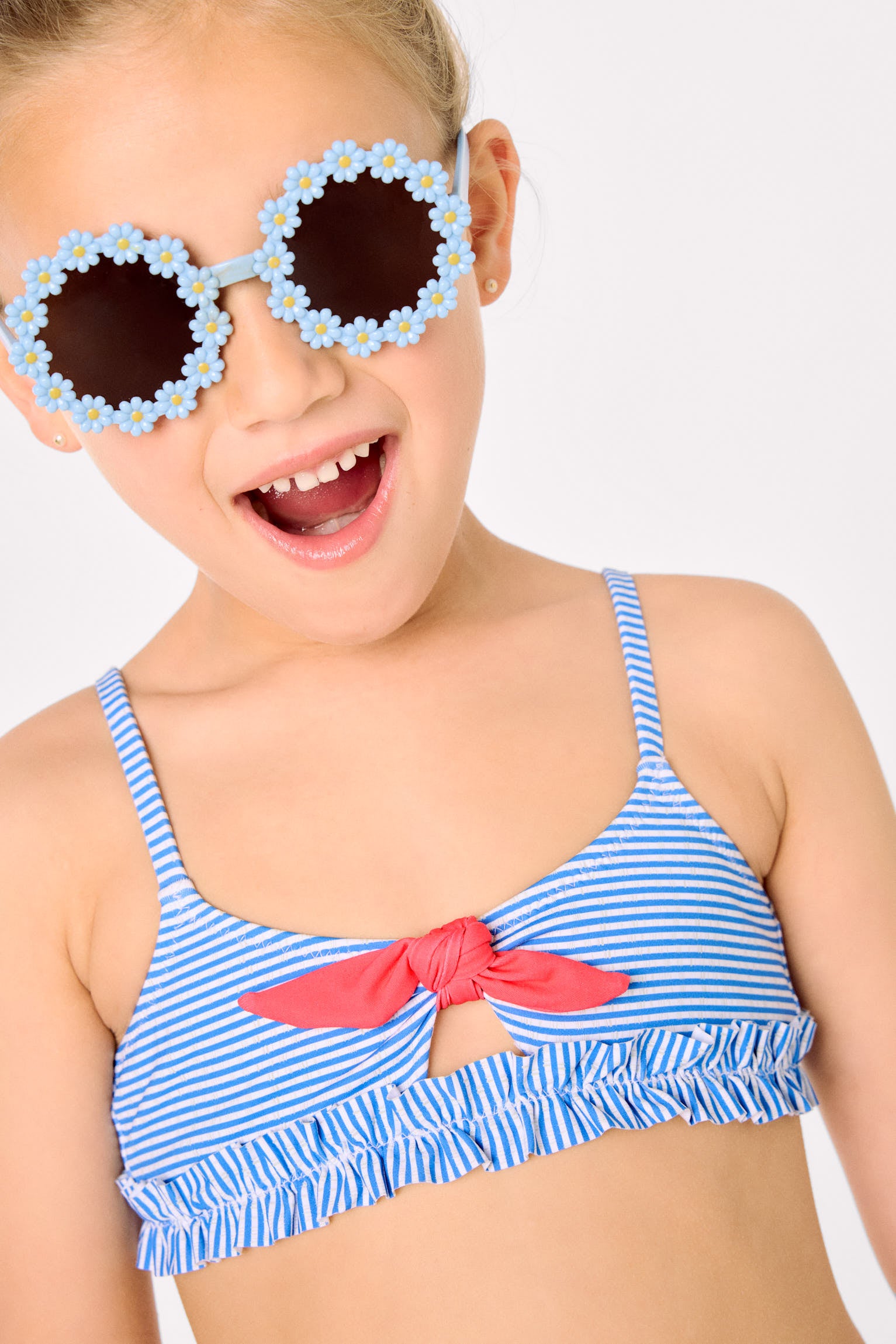 Girls' bikini with bow detail and ruching, striped print