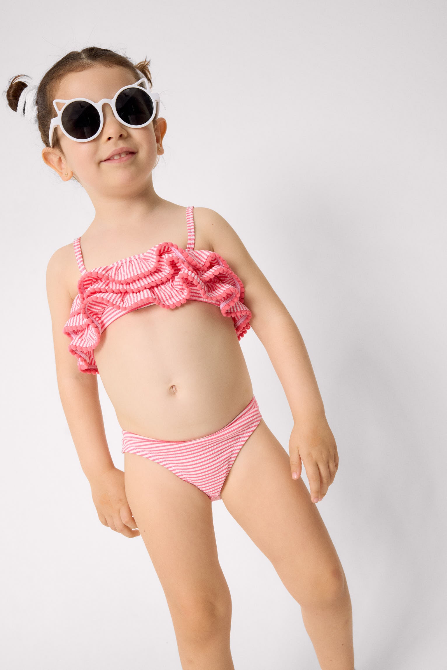 Girls' bikini with triple ruffle detail and striped print
