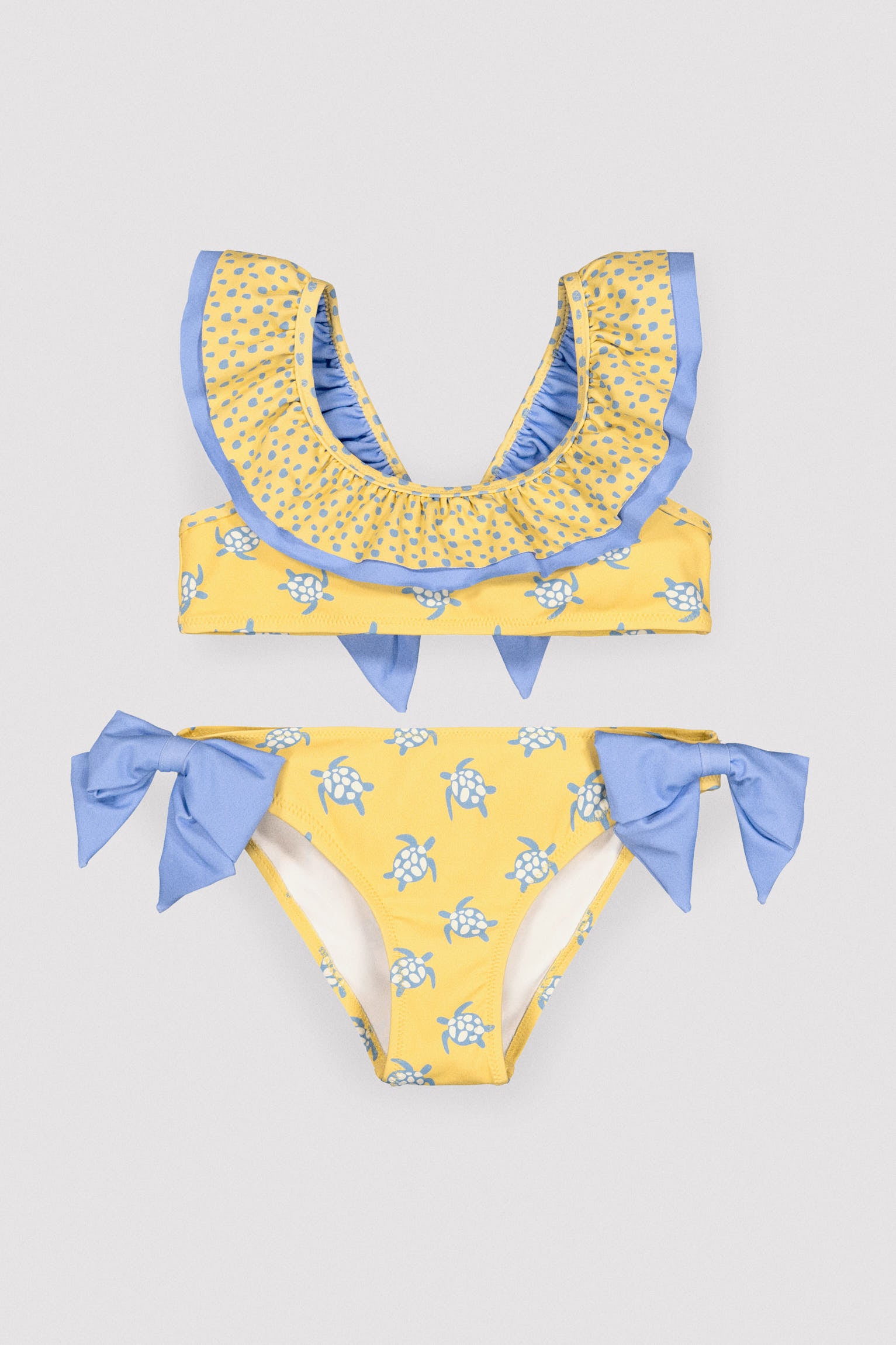 Bikini niña detalle volante y lazos estampado tortugas - Ysabel Mora