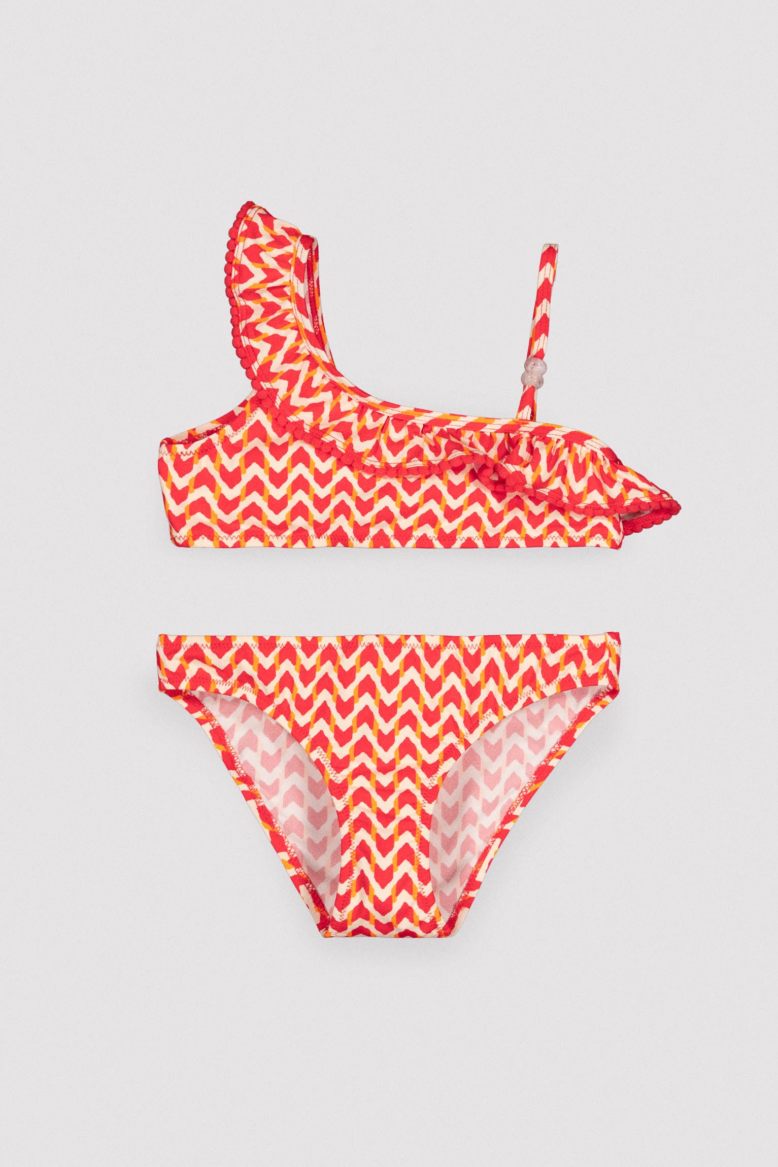 Asymmetrical bikini for girls with ethnic print ruffle detail