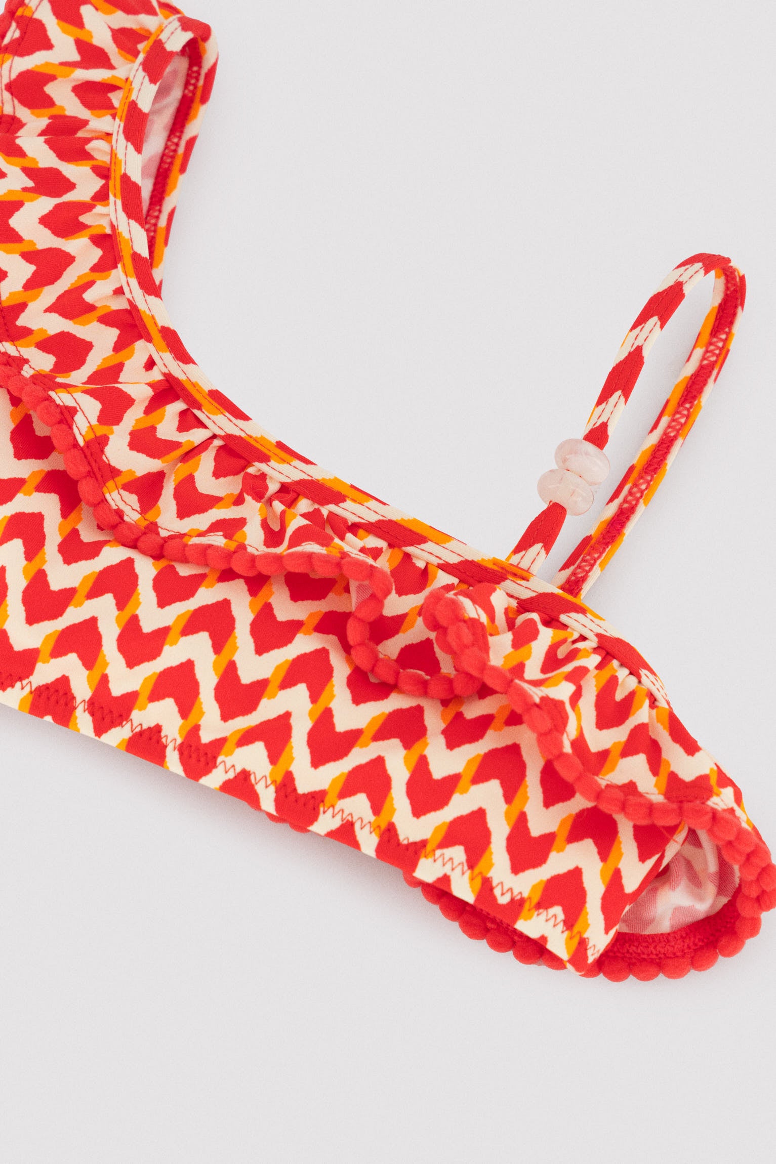 Asymmetrical bikini for girls with ethnic print ruffle detail