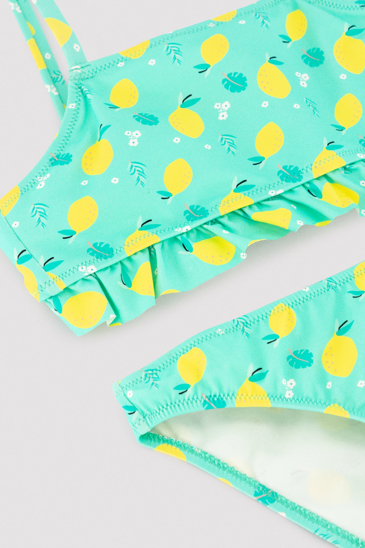 Girl's bikini with lemon print ruffle detail