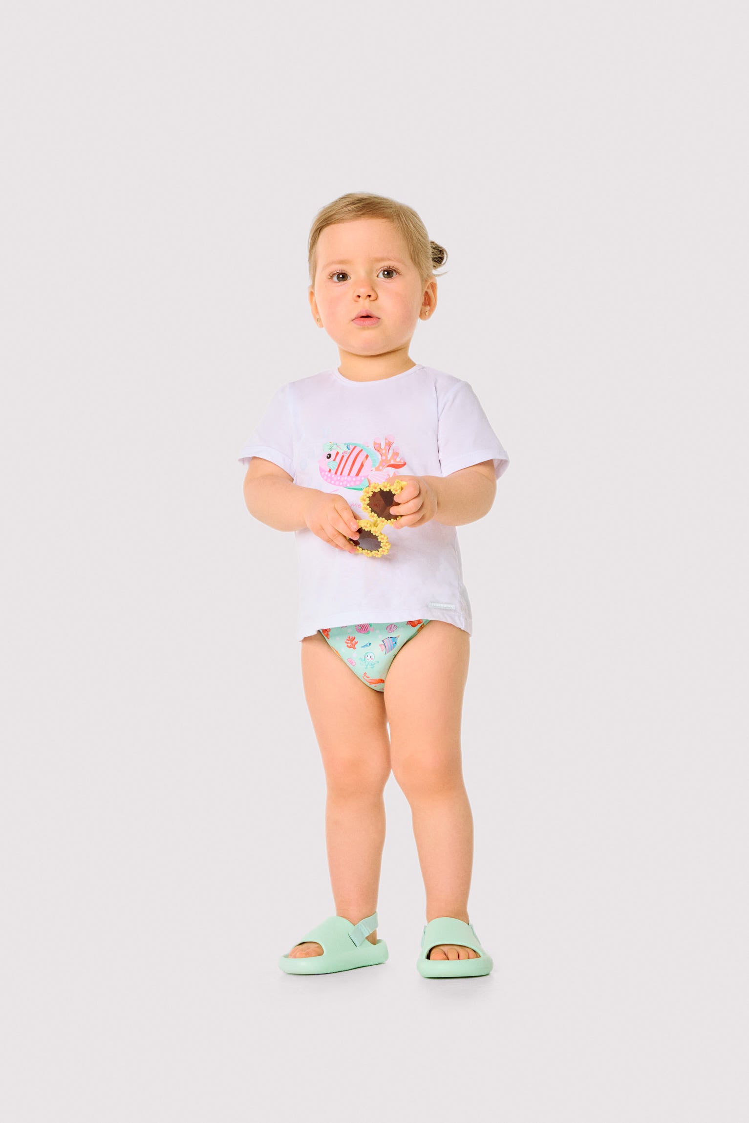 Baby set with t-shirt and bloomers featuring a marine animal print