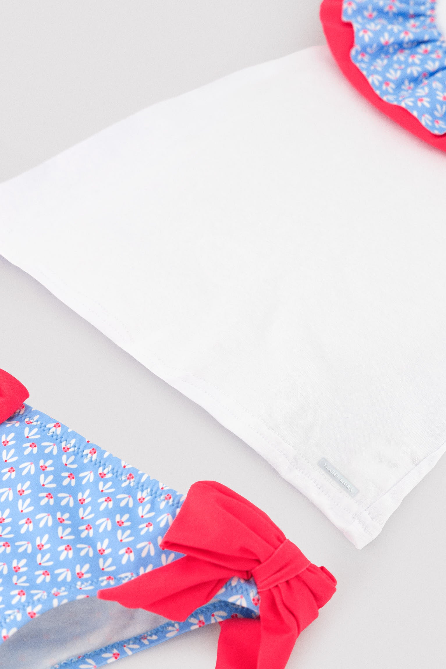 Baby set: t-shirt and bloomers with ruffle and bow details, floral print