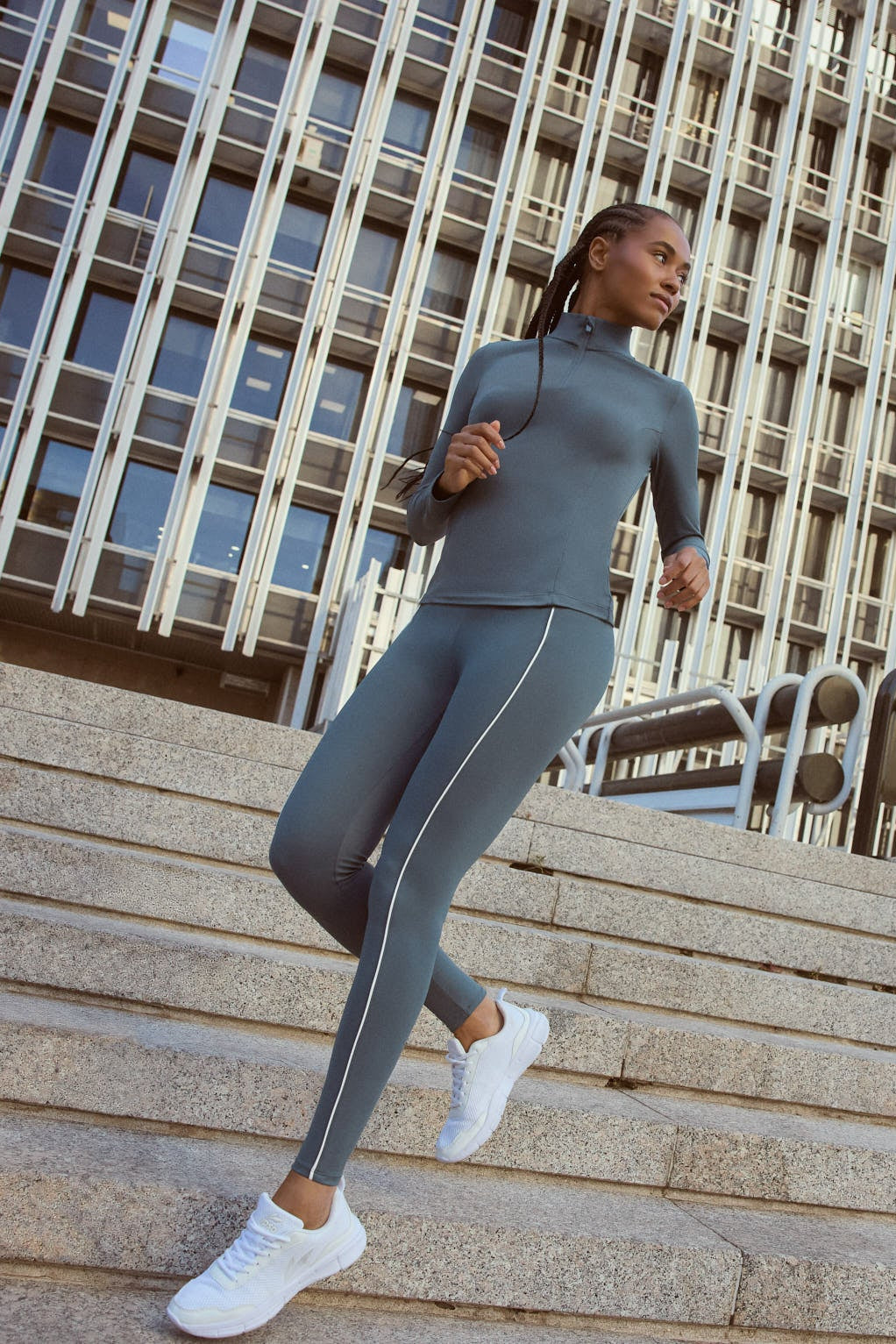 Women's blue full-length sports leggings with push-up effect