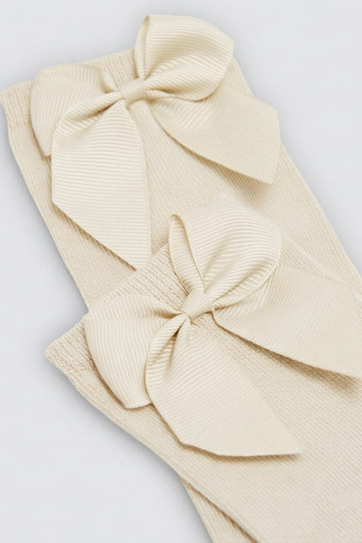Children's long ivory socks with bow detail