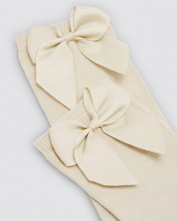 Children's long ivory socks with bow detail